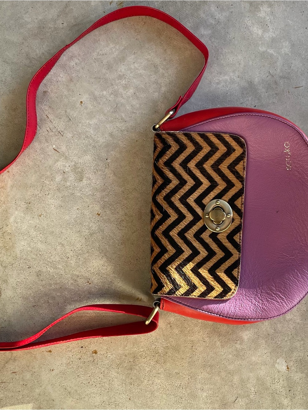 Soruka Pink and Red Crossbody Bag with Zebra Chevron Clutch Accent